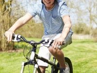Young Boy Riding Bike Along Country Track. Foto: Slagelse kommune